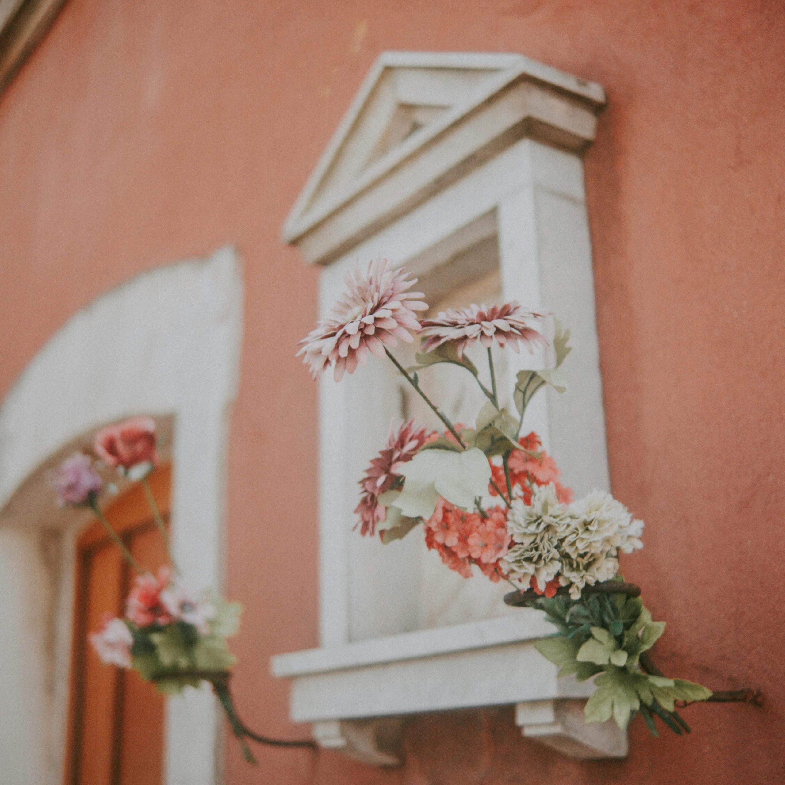 ピンクの家に花の写真